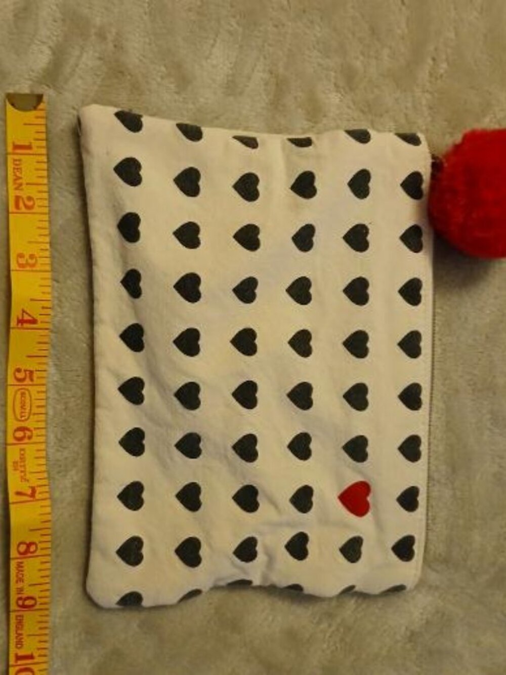 Cute heart print zipper bag with pom accent